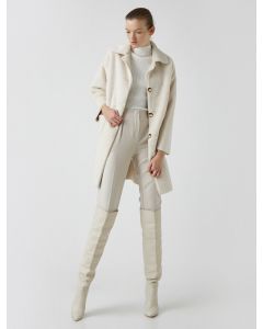 Manteau en fausse fourrure à poche