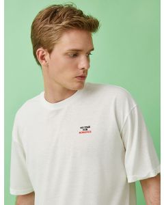 T-shirt à slogan en coton imprimé WHITE M