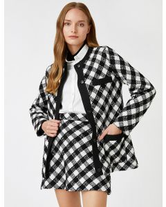 Veste à carreaux avec poche boutonnée